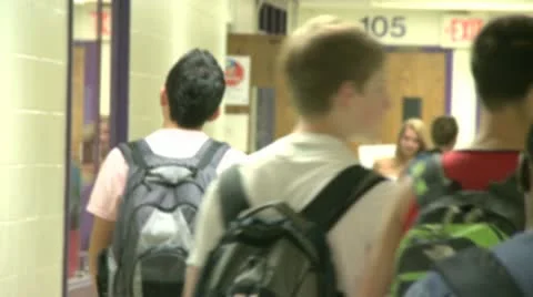 Junior high students walking down hallway  (2 of 8) Video stock 10380599