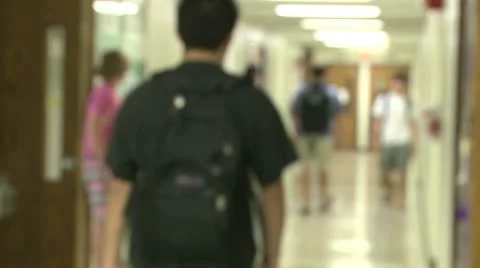 Junior high students walking down hallway  (6 of 8) Stock Footage 10381387