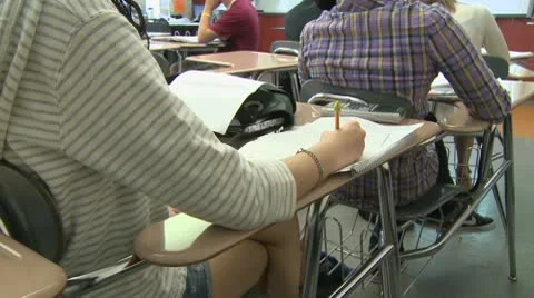 Junior high students writing in class (3 of 6) Stock Footage 10333419