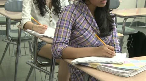 Junior hight students writing in class (6 of 6) Stock Footage 10334579
