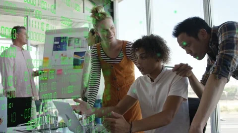 Junior man typing, team gathering, pointing at laptop as green code overlay Stock Footage 333477776