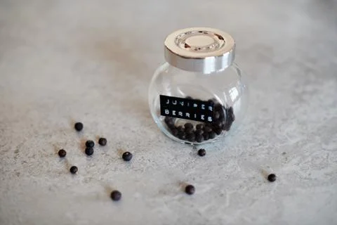 Juniper Berries in a small Jar Stock Photos
