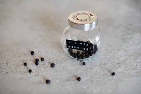 Juniper Berries in a small Jar Stock Photos