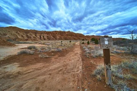 Juniper Draw Trail Sign and Desert Path in Cathedral Gorge State Park Nevada Stock Photos