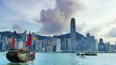 Junk boat in Victoria Harbour in Hong Kong Stock Footage