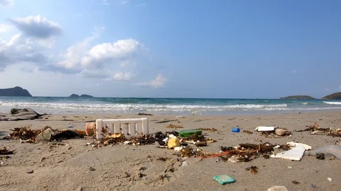 Junk garbage dirty on the beach environment pollution background in Thailand. Stock Footage 103313253