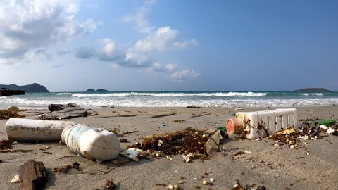 Junk garbage dirty on the beach environment pollution background in Thailand. Video stock 103313682