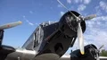 Junkers Ju 52 traditional propeller airplane close up front view on airfield 4k or 4k+ Resolution