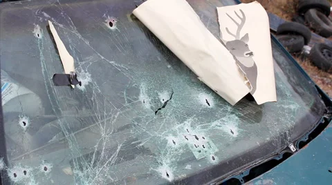 Junkyard windshield with gunshots Stock-Footage 5164686
