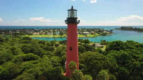 Jupiter, Florida Lighthouse with Ocean and Inlet in Background Stock Footage 196113944