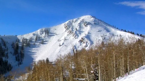 Jupiter Peak in winter with ski tracks, Park City, Utah. Stock Footage 106790403