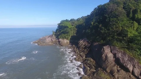 Juquehy, Waves upon the rocks on tropical beach Stock Footage 127234220