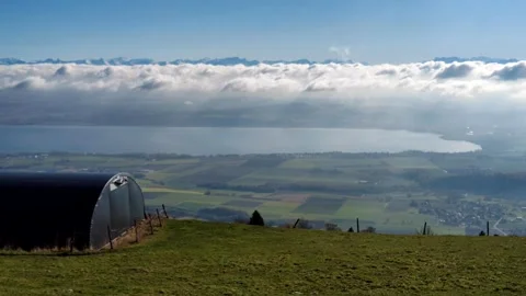 Jura View: Lake &amp; Cloud Inversion, Alps in background Stock Footage 303980079