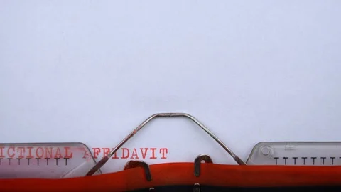 Jurisdictional affidavit - phrase printed on an old typewriter in red letters Video stock 128400873