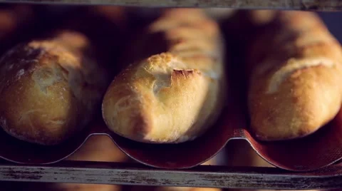 Just baked bread loafs on the shelves in a bakery. 動画素材 60056675
