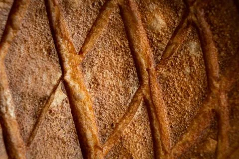 Just baked breads surface as a background. Stock Photos