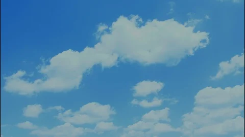 Just a blue sky with moving white cumulus clouds, 4K. Stock Footage 112249378