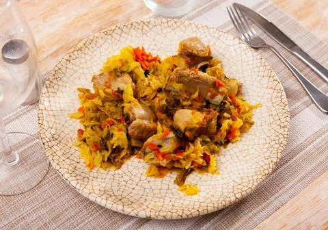 Just cooked portion of pork meat stewed with cabbage Stock Photos