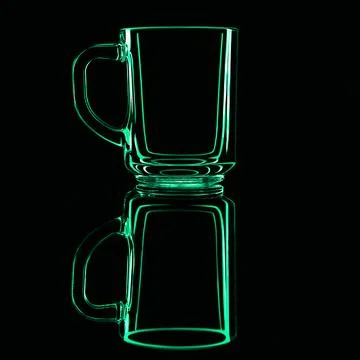 Just a glass on a black background with a reflection. Green colors. Stock Photos