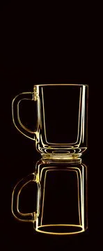 Just a glass on a black background with a reflection. Yellow colors. Stock Photos