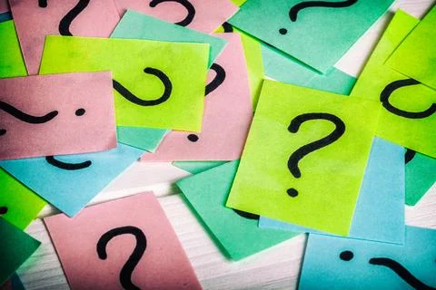 Just a lot of question marks on colored papers 스톡 사진