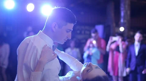 Just married couple is dancing at wedding party their first shindig Stock Footage 65336076