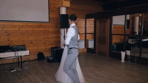 Just married couple is dancing at wedding party Stock Footage 106349917