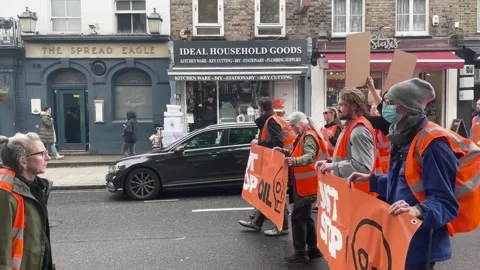 Just Stop Oil protesters block traffic in Camden Stock Footage 240718988