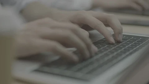 Just typing in the front of laptop in the office Stock Footage 119576591