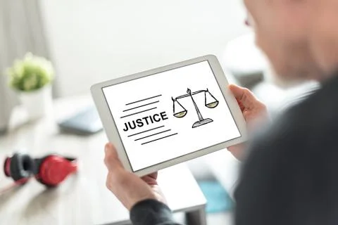 Justice concept on a tablet 스톡 사진