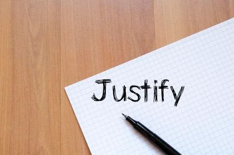 Justify write on notebook Stock Photos