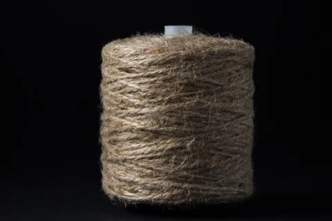 Jute thread on a black background. Stock Photos