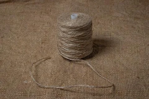 Jute thread on burlap.  Stock Photos
