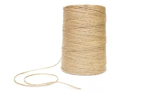 Jute thread spool on white isolated background Stock-Fotos