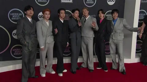 K-pop star Suga begins process to serve  | Stock Video