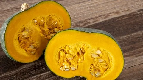 Kabocha Squash Cut In Half, Seeds Visible, Close-Up Stock Footage 339281096