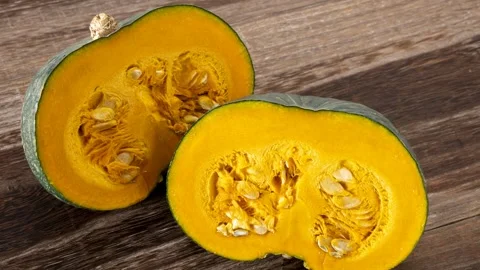 Kabocha Squash Cut In Half, Seeds Visible, Close-Up Stock Footage 340550246
