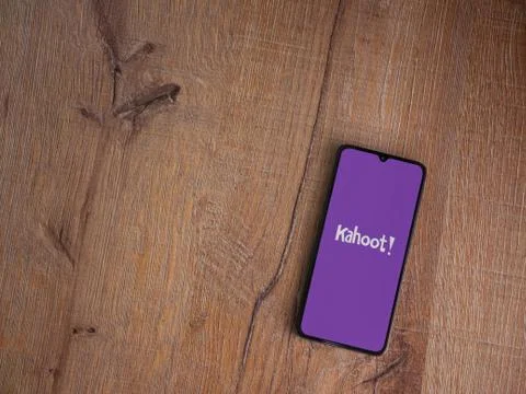 Kahoot! app launch screen with logo on the display of a black mobile smartpho Stock Photos
