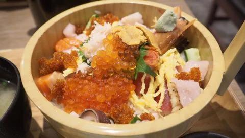 Kaisendon or The raw fish on rice comes with uni, salmon ,Ikura ,ebi ,crab,ho Stock Photos