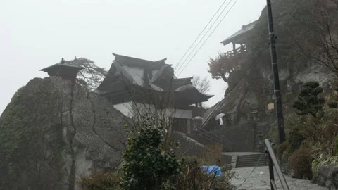 Kaizan Do and Nokyo Do Halls on a rainy and foggy day Video stock 149968219