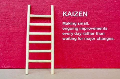 KAIZEN text on red background with ladder representing presenting the Kaize.. Stock Photos