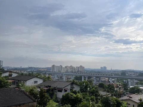Kajang Cityscape with MRT Train on Elevated Railway Stock Photos