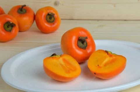 Kaki apples Stock Photos