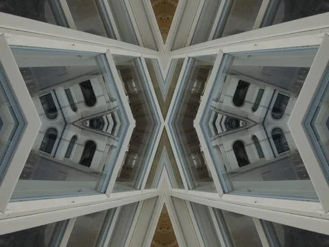 Kaleidoscope pattern of mirrored architectural elements Stock Photos