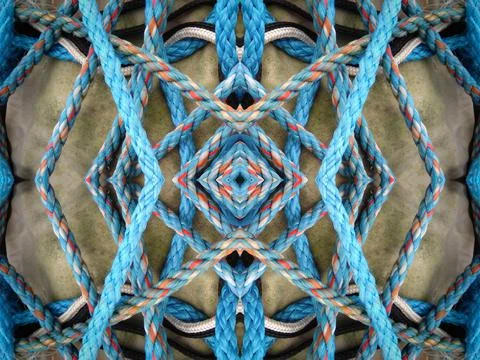 Kaleidoscope pattern of overlapping and knotted rope forming geometric shapes Stock Photos
