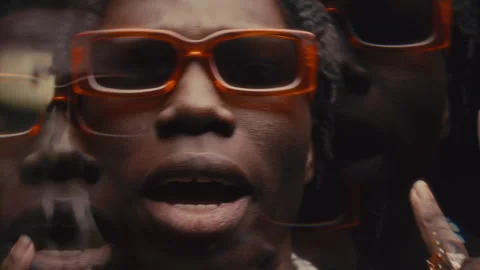 Kaleidoscopic Effect of Black Rapper in Sunglasses Performing Hip-Hop on Camera Stock Footage 286786495