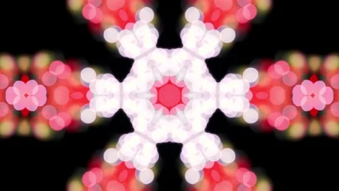 Kaleidoscopic image featuring rainbow tones and ornamental mandala-like shapes. Video stock 313808507