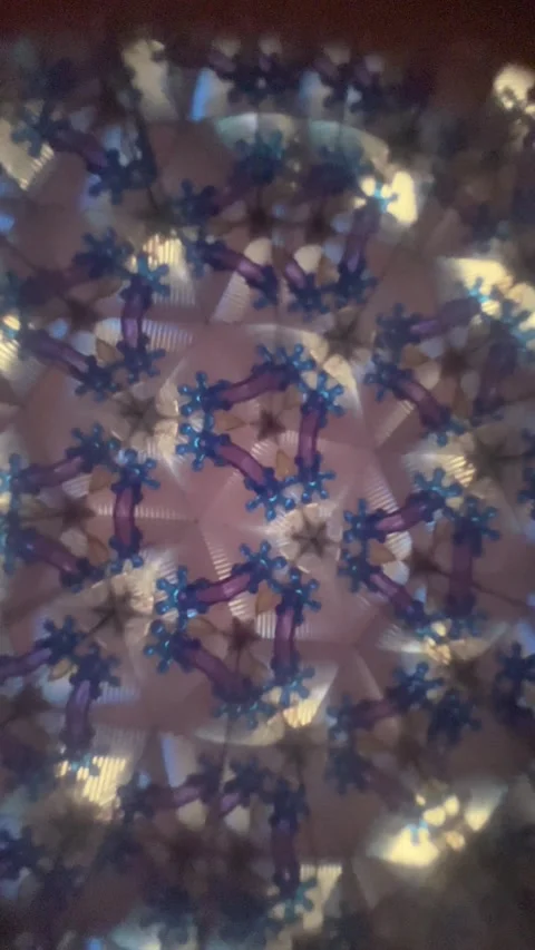 Kaleidoscopic pattern creating a hypnotic mesmerizing abstract backgroun 動画素材 341854341