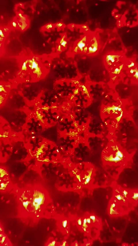 Kaleidoscopic view of glowing red and yellow snowflake patterns Видео 341854591