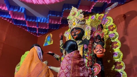 Kali puja people doing boron or puja Stock Footage 166259251